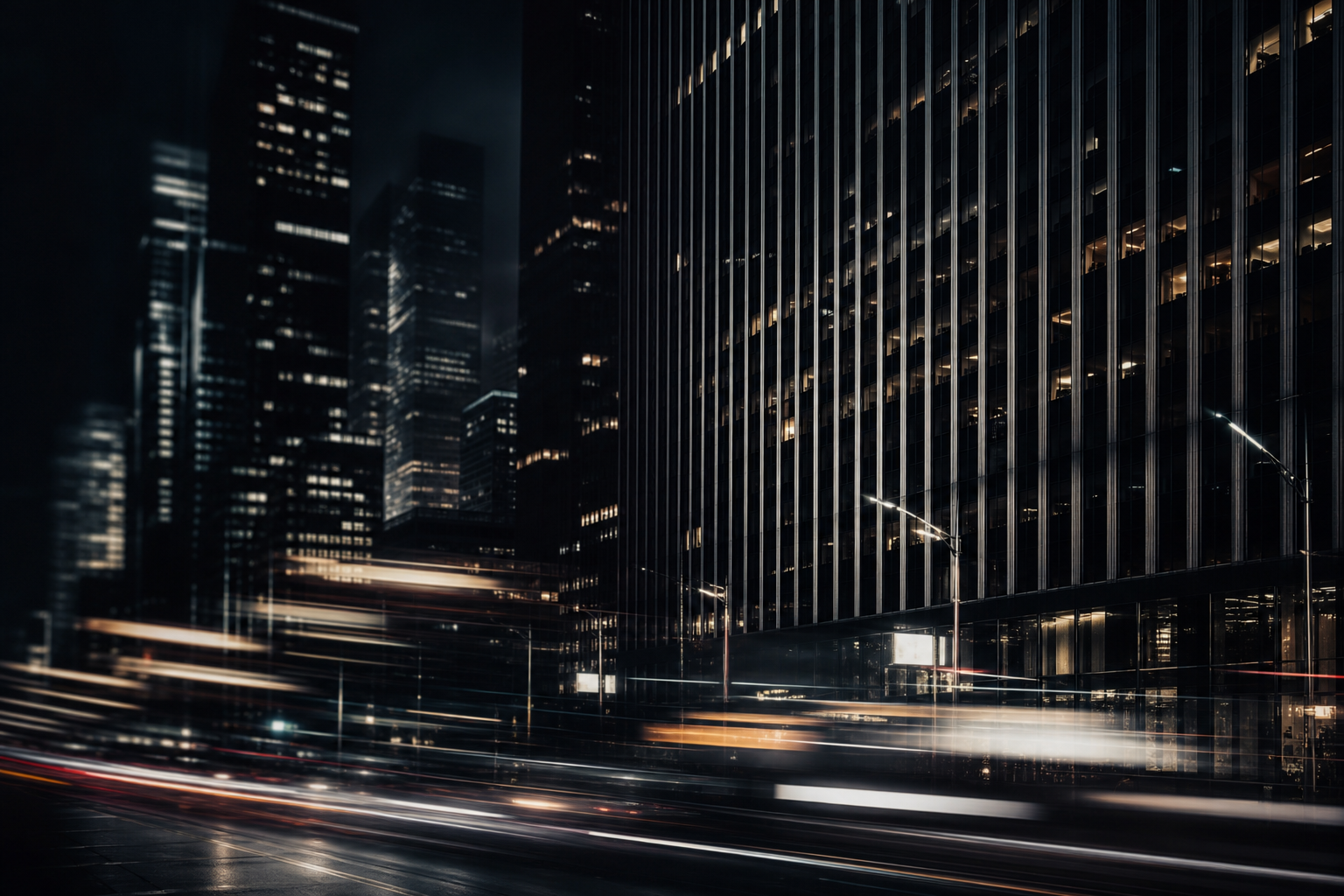 Motion-blurred Manhattan building facades at night